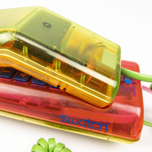 Laden Sie das Bild in den Galerie-Viewer, Teléfono Twin Swatch 1989. Translucido. - falsotecho