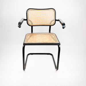 B64 or Cesca chair designed by Marcel Breuer in 1928. 