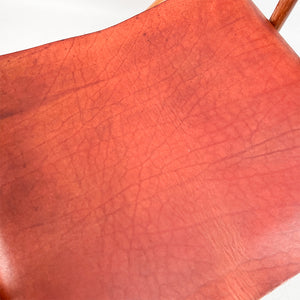 Sillón plegable de cuero y madera fabricado en Costa Rica, 1970's