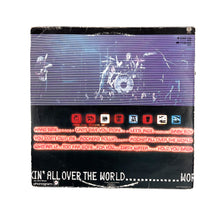 画像をギャラリービューアに読み込む, LP. Status Quo. Rockin' All Over The World
