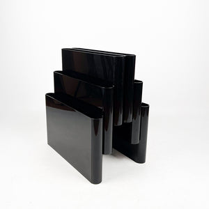 Kartell 4675 magazine rack designed by Giotto Stoppino in 1971. 