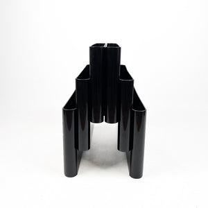 Kartell 4675 magazine rack designed by Giotto Stoppino in 1971. 