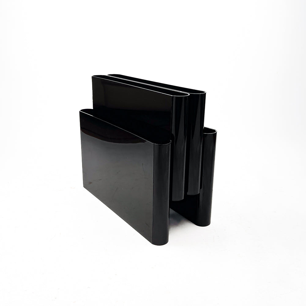 Kartell 4676 magazine rack, designed by Giotto Stoppino in 1971.