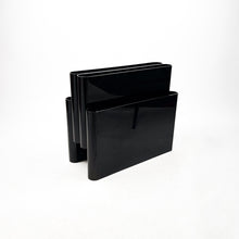 Load image into Gallery viewer, Kartell 4676 magazine rack, designed by Giotto Stoppino in 1971.
