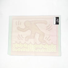Load image into Gallery viewer, Bath mat made by Axis with design by Keith Haring. 
