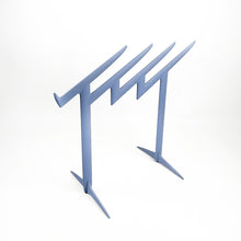 Load image into Gallery viewer, Claudia Evangelista magazine rack, designed by Philippe Starck for Kartell in 1996. 
