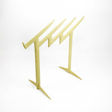 Load image into Gallery viewer, Claudia Evangelista magazine rack, designed by Philippe Starck for Kartell in 1996. 
