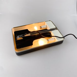 Mini Fase model lamp, designed by Tomás Díaz Magro in 1969. 