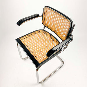 B64 or Cesca chair designed by Marcel Breuer in 1928.