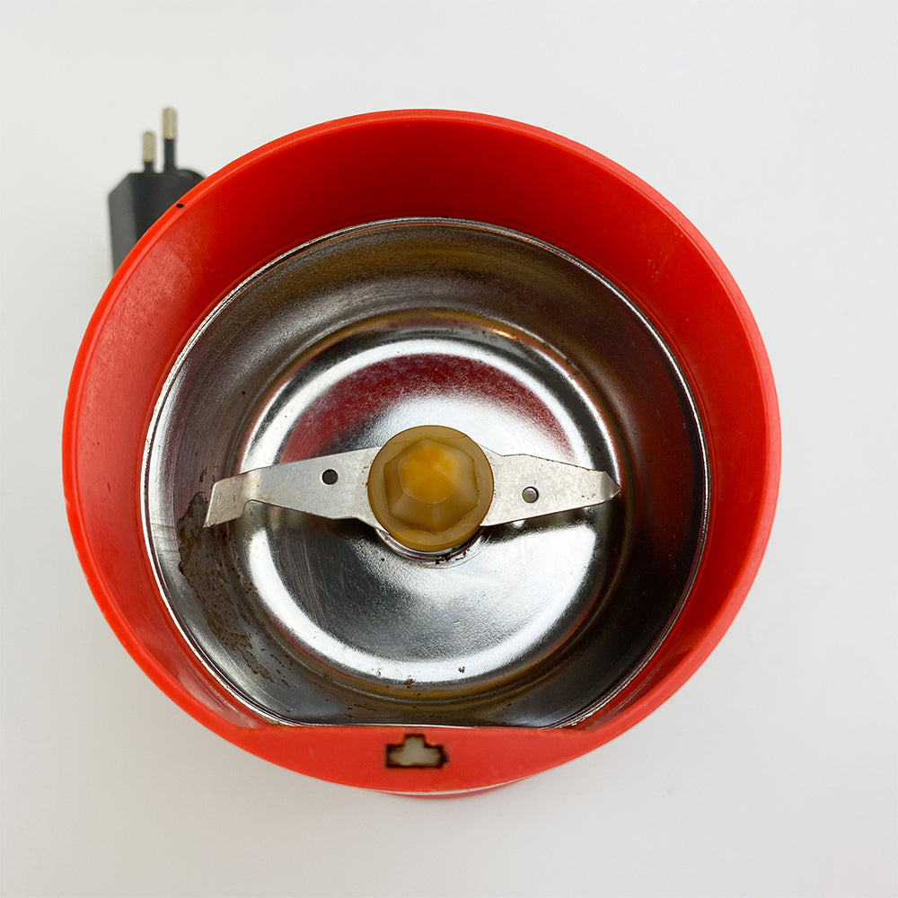 Braun KSM2 grinder designed by Hartwig Kahlcke in 1979. Red – falsotecho