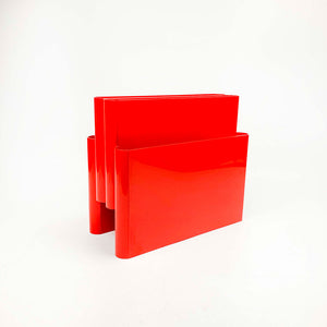 Kartell 4676 magazine rack designed by Giotto Stoppino in 1971.