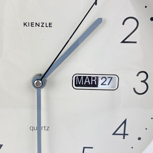 Reloj de pared Kienzle con calendario, 1980's - falsotecho