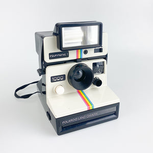 Cámara Polaroid Land 1000 con Flash Polatronic 1.