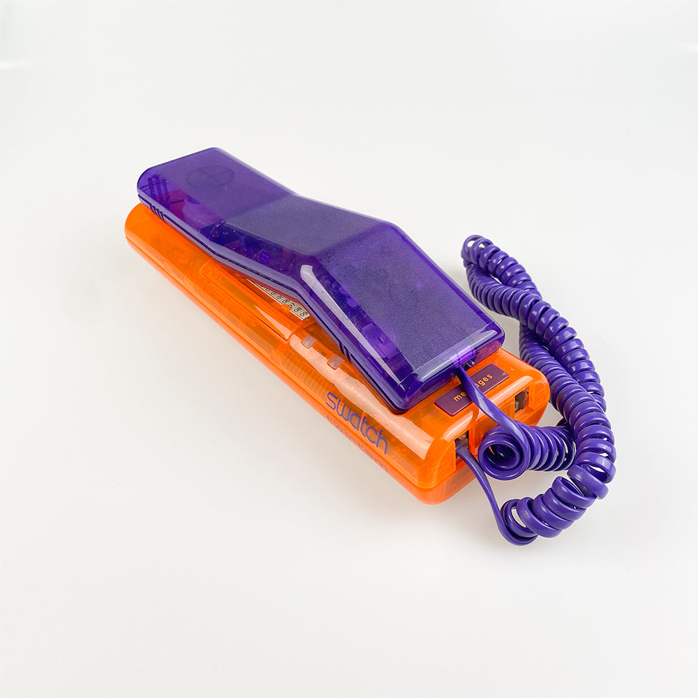 Teléfono Swatch Twinphone morado y naranja, 1989.