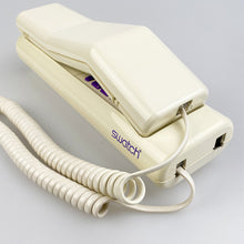 Load image into Gallery viewer, White Swatch Deluxe phone, 1989.
